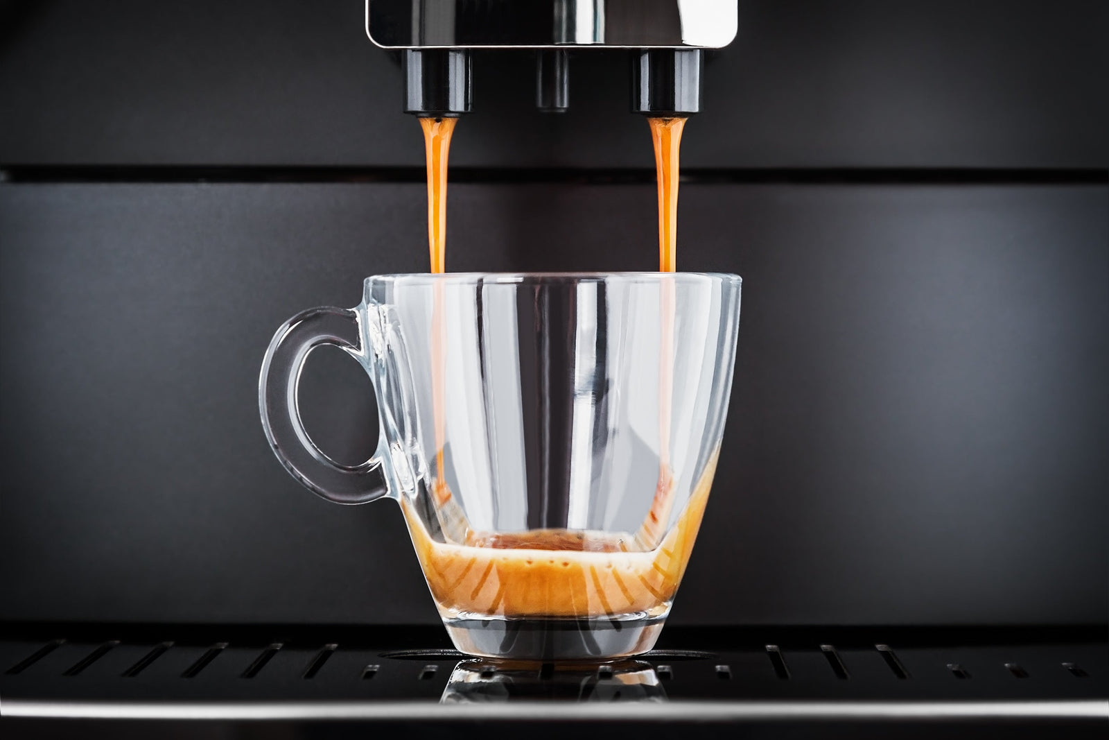 Coffee pouring from bean to cup coffee machine