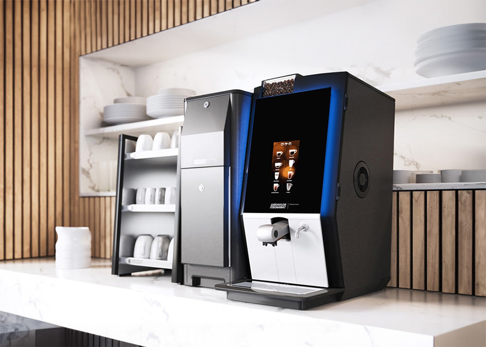 Bravilor Bonamat fully automated bean to cup coffee machine with fridge  in a office.