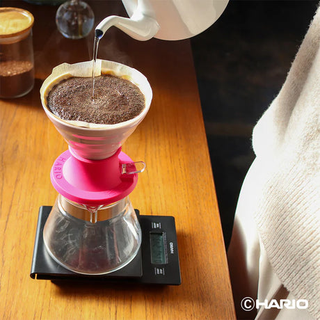 Hario Switch V60 Ceramic Immersion Dripper Size 02 - Berry Pink Pouring Water Over Coffee Grinds