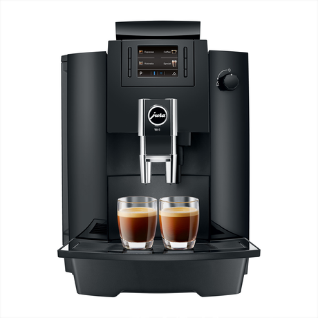 JURA WE6 professional coffee machine with user-friendly display, ideal for preparing a variety of coffee specialties in small to medium-sized workplaces.