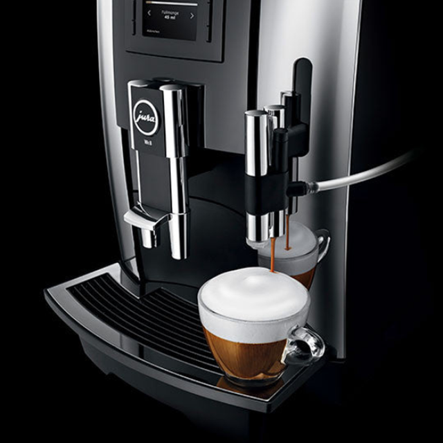 Jura WE8 Bean-to-Cup Coffee Machine with one-touch operation, 12 programmable drink options, and Pulse Extraction Process (P.E.P.), ideal for small offices and self-service areas I Redber Coffee