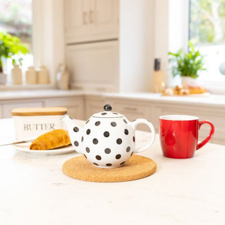 London Pottery Globe 2 Cup Teapot White With Black Spots Lifestyle with red mug and breakfast