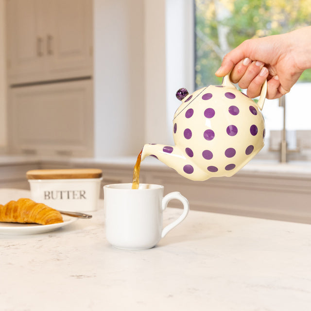 London Pottery Globe 4 Cup Teapot Ivory With Aubergine Spots Pouring Tea