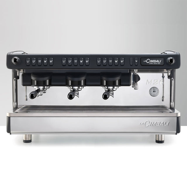 La Cimbali M26 SE espresso machine, ideal for cafés and restaurants. Features Italian craftsmanship, ThermoDrive Technology for consistent temperature control, and energy-saving mode. Available in sleek black and white finishes for reliable, barista-quality coffee service.