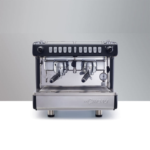 La Cimbali M26 TE RE espresso machine, ideal for high-volume cafés and restaurants. Features ThermoDrive Technology, an intuitive display, energy-saving mode, and is available in White, Black, and Green Machine finishes. Perfect for consistent, barista-quality coffee with Italian craftsmanship and advanced functionality.