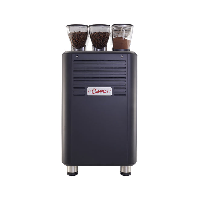 Compact La Cimbali S15 bean-to-cup coffee machine, designed for offices, hotels, and small businesses. Features include a 7-inch touchscreen, Turbo Milk system for quality milk foam, and remote monitoring via telemetry. Ideal for delivering up to 150 cups per day with consistent, Italian-style espresso quality.