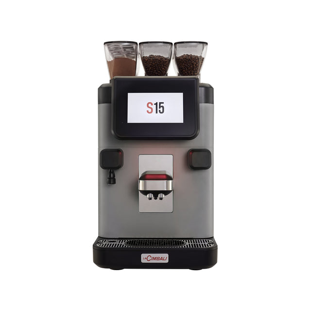 Compact La Cimbali S15 bean-to-cup coffee machine, designed for offices, hotels, and small businesses. Features include a 7-inch touchscreen, Turbo Milk system for quality milk foam, and remote monitoring via telemetry. Ideal for delivering up to 150 cups per day with consistent, Italian-style espresso quality.