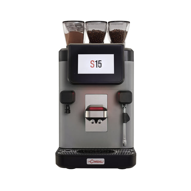 Compact La Cimbali S15 bean-to-cup coffee machine, designed for offices, hotels, and small businesses. Features include a 7-inch touchscreen, Turbo Milk system for quality milk foam, and remote monitoring via telemetry. Ideal for delivering up to 150 cups per day with consistent, Italian-style espresso quality.