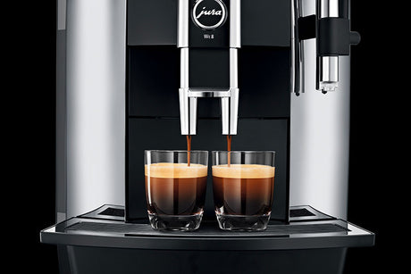 Jura WE8 Bean-to-Cup Coffee Machine with one-touch operation, 12 programmable drink options, and Pulse Extraction Process (P.E.P.), ideal for small offices and self-service areas I Redber Coffee